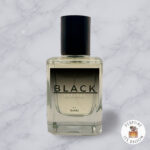 Buy Black by B.UNIQ Extrait de perfume - bottle on a marble background, Perfume Lex Bloom store. bottle on a light marble background