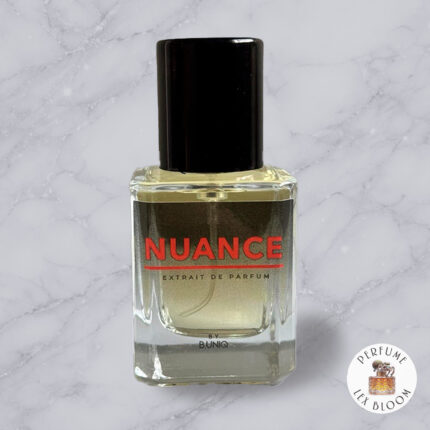 Nuance by B.UNIQ Extrait de Parfum bottle on a light marble background