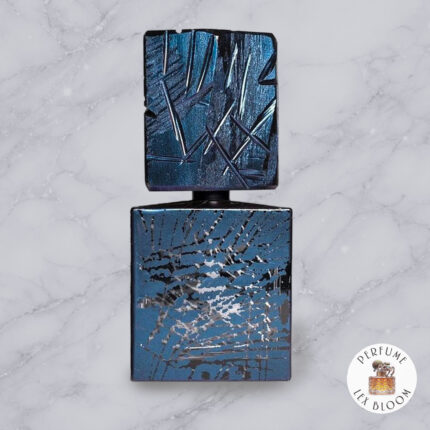 Scusami by Filippo Sorcinelli perfume decant on a marble background with Lexbloom store logo.